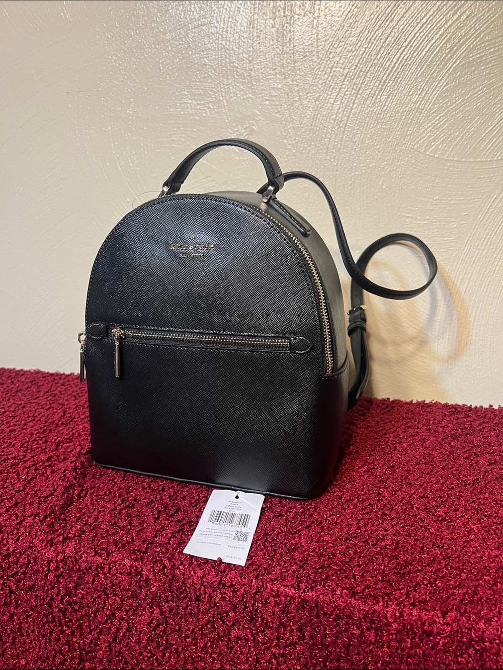 Kate spade black leather mini backpack